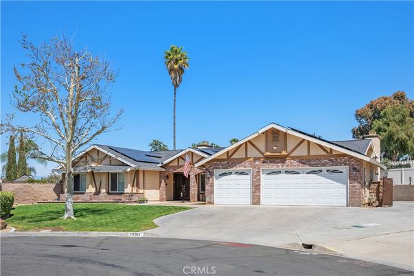Attached, Exterior, Facade, Solar Panels, Tudor Revival