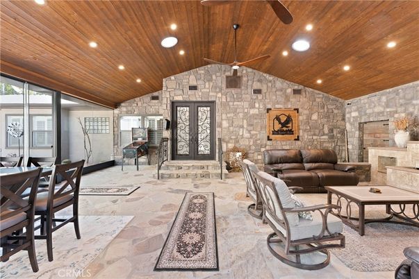 Fireplace, Interior, Living room, Recessed Lighting, Stone Walls, Wooden Ceilings
