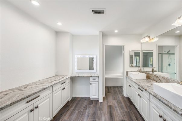 Bathroom, Dual Sink Vanities, Interior, Recessed Lighting, Wood Texture Flooring