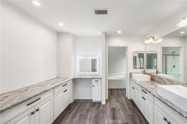 Bathroom, Dual Sink Vanities, Interior, Recessed Lighting, Wood Texture Flooring