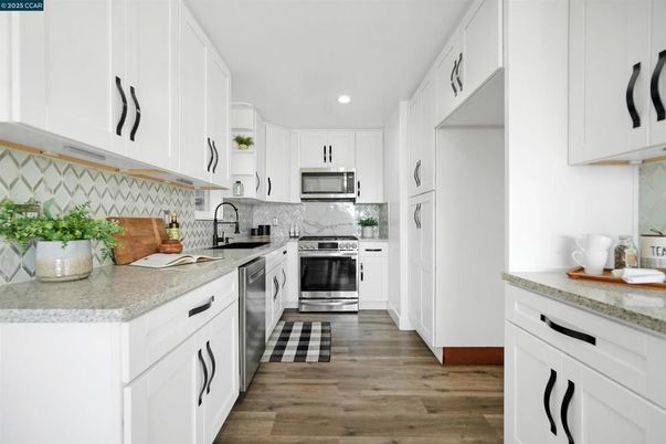 Interior, Kitchen, Recessed Lighting, Stainless Steel Appliances, Wood Texture Flooring