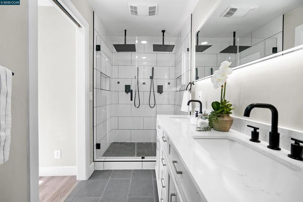 Bathroom, Dual Sink Vanities, Glass Shower, Interior, Recessed Lighting, Wood Texture Flooring