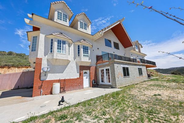 Attached, Exterior, Facade, Brick Facade, Spanish Mediterranean