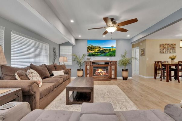 Dining room, Fireplace, Interior, Living room, Recessed Lighting, Wood Texture Flooring