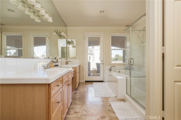 Bathroom, Dual Sink Vanities, Glass Shower, Interior, Recessed Lighting, Tile Countertops