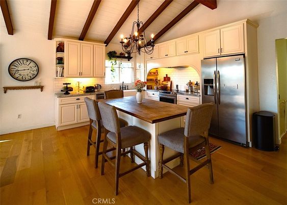 Chandelier, Dining room, Interior, Kitchen, Stainless Steel Appliances, Wooden Beams, Wood Texture Flooring