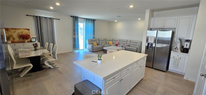 Dining room, Interior, Kitchen, Living room, Recessed Lighting, Stainless Steel Appliances, Wood Texture Flooring