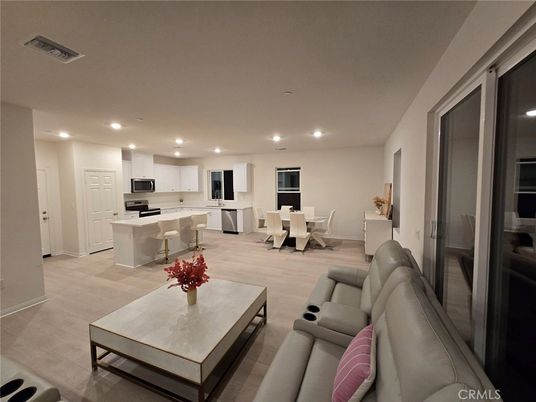Dining room, Interior, Kitchen, Living room, Recessed Lighting, Stainless Steel Appliances, Wood Texture Flooring