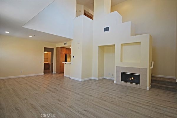 Fireplace, Interior, Recessed Lighting, Wood Texture Flooring