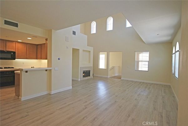 Fireplace, Interior, Kitchen, Recessed Lighting, Wood Texture Flooring