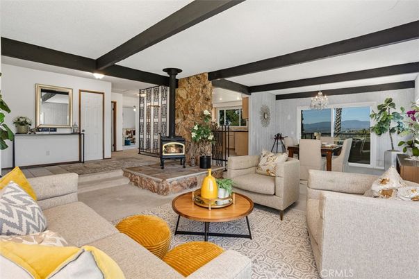 Chandelier, Dining room, Fireplace, Interior, Living room, Recessed Lighting, Wooden Beams