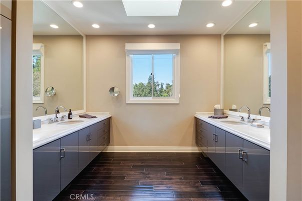 Bathroom, Dual Sink Vanities, Interior, Recessed Lighting, Wood Texture Flooring