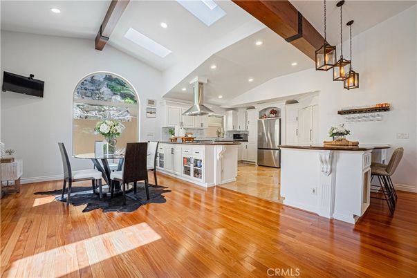 Dining room, Interior, Kitchen, Pendant Lights, Recessed Lighting, Stainless Steel Appliances, Wooden Beams, Wood Texture Flooring