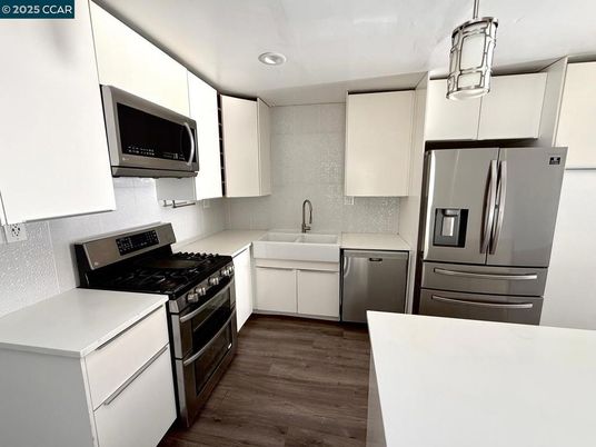 Interior, Kitchen, Recessed Lighting, Stainless Steel Appliances, Wood Texture Flooring