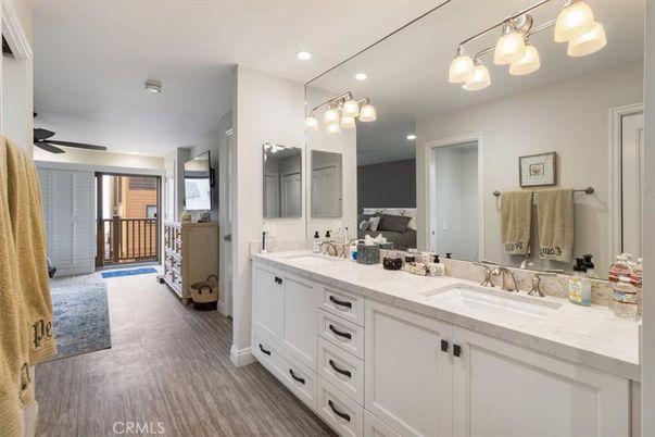 Bathroom, Dual Sink Vanities, Interior, Recessed Lighting, Wood Texture Flooring