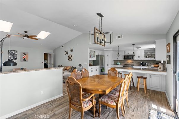 Dining room, Interior, Kitchen, Pendant Lights, Stainless Steel Appliances, Wood Texture Flooring