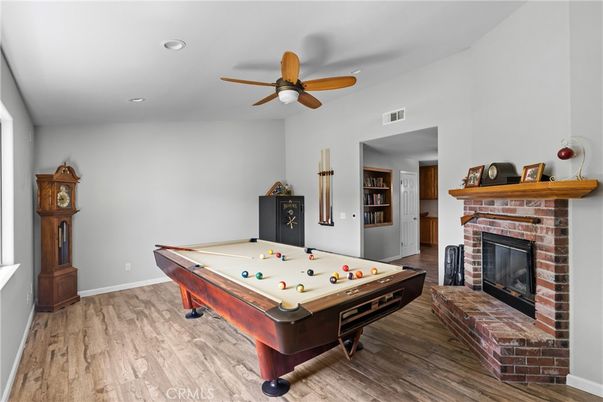 Billiard Table, Fireplace, Game Room, Interior, Recessed Lighting, Wood Texture Flooring