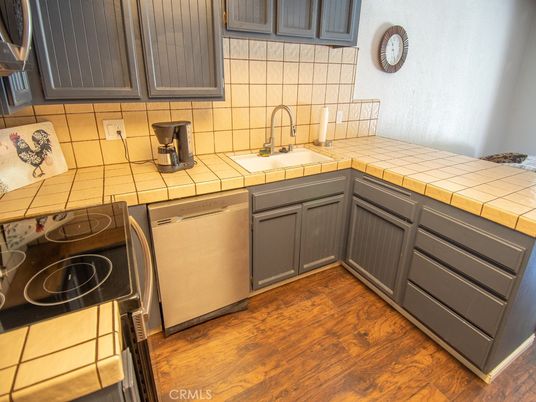 Interior, Kitchen, Tile Countertops, Wood Texture Flooring