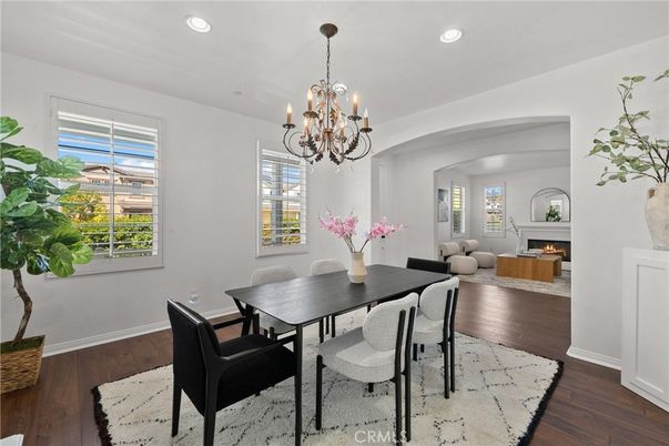 Chandelier, Dining room, Fireplace, Interior, Living room, Recessed Lighting, Wood Texture Flooring