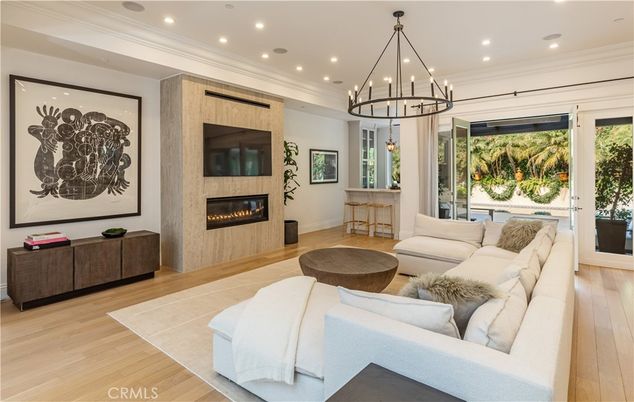 Chandelier, Fireplace, Interior, Living room, Recessed Lighting, Wood Texture Flooring