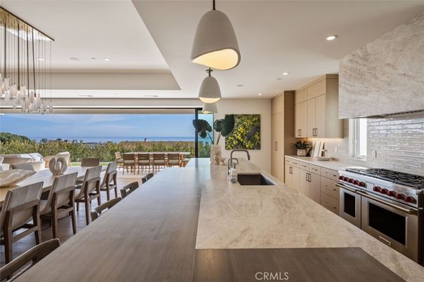 Dining room, Interior, Kitchen, Pendant Lights, Recessed Lighting, Stainless Steel Appliances, Water, Wood Texture Flooring