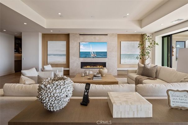 Fireplace, Interior, Living room, Recessed Lighting, Water, Wood Texture Flooring