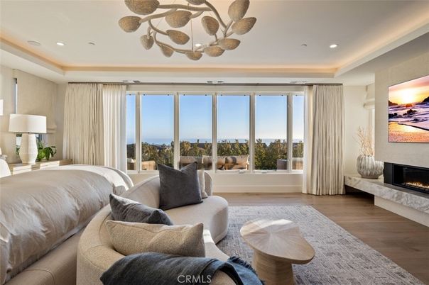Bedroom, Fireplace, Interior, Living room, Recessed Lighting, Water, Wood Texture Flooring