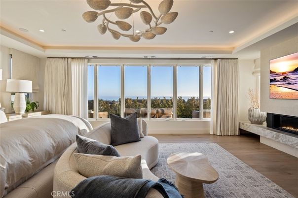 Bedroom, Fireplace, Interior, Living room, Recessed Lighting, Water, Wood Texture Flooring