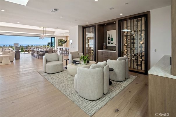 Dining room, Interior, Living room, Pendant Lights, Recessed Lighting, Wine Storage, Wood Texture Flooring