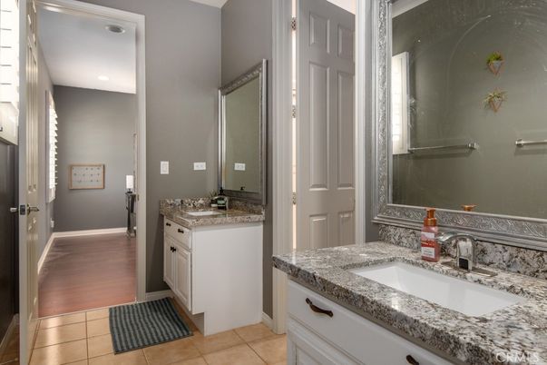 Bathroom, Dual Sink Vanities, Interior, Recessed Lighting, Wood Texture Flooring