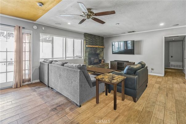 Fireplace, Interior, Living room, Recessed Lighting, Wood Texture Flooring