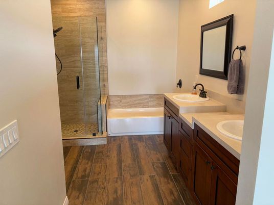 Bathroom, Dual Sink Vanities, Glass Shower, Interior, Wood Texture Flooring