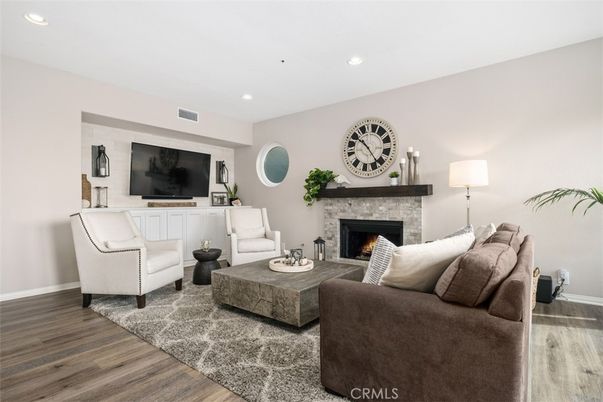 Fireplace, Interior, Living room, Recessed Lighting, Wood Texture Flooring
