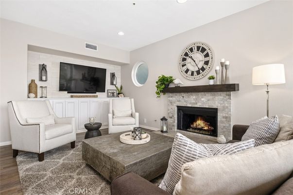 Fireplace, Interior, Living room, Recessed Lighting, Wood Texture Flooring