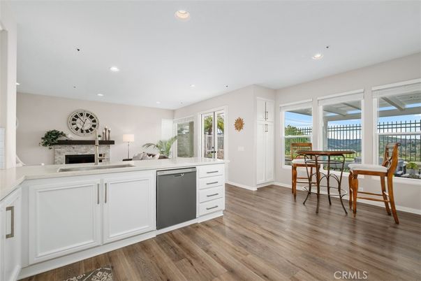 Dining room, Fireplace, Interior, Kitchen, Recessed Lighting, Wood Texture Flooring