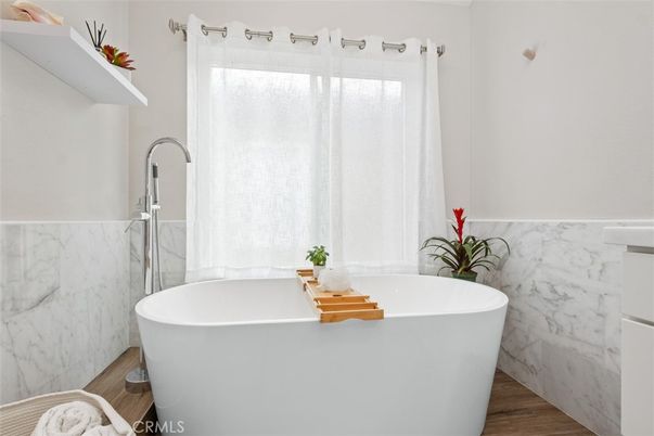 Bathroom, Free Standing Baths, Interior, Marble Walls, Wood Texture Flooring