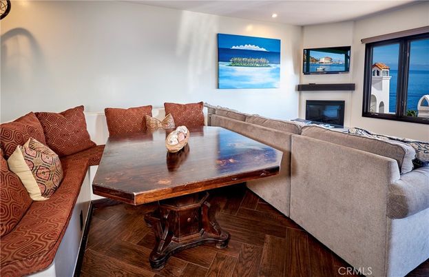 Dining room, Fireplace, Interior, Living room, Recessed Lighting, Wood Texture Flooring