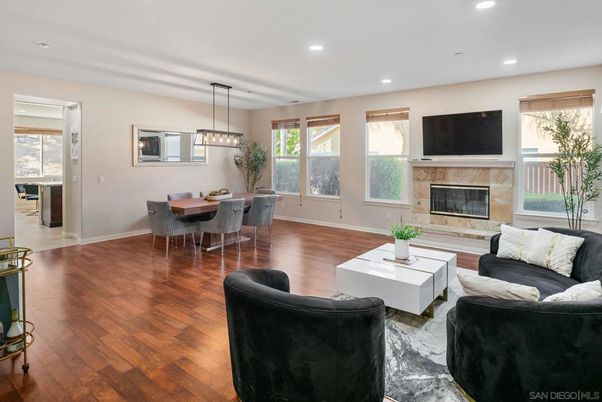 Dining room, Fireplace, Interior, Living room, Pendant Lights, Recessed Lighting, Wood Texture Flooring