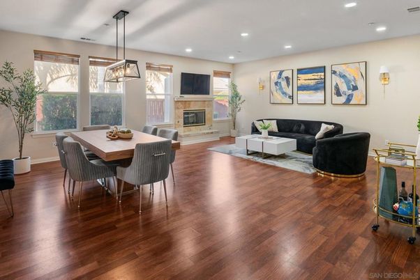 Dining room, Fireplace, Interior, Living room, Pendant Lights, Recessed Lighting, Wood Texture Flooring