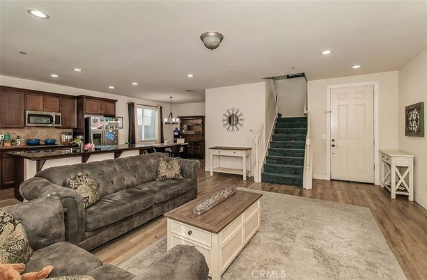 Dining room, Interior, Kitchen, Living room, Pendant Lights, Recessed Lighting, Stainless Steel Appliances, Wood Texture Flooring