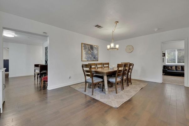 Chandelier, Dining room, Interior, Piano, Wood Texture Flooring