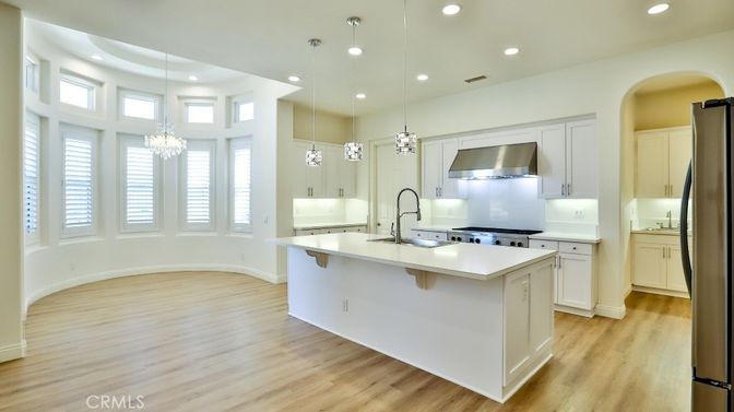 Chandelier, Interior, Kitchen, Pendant Lights, Recessed Lighting, Stainless Steel Appliances, Wood Texture Flooring