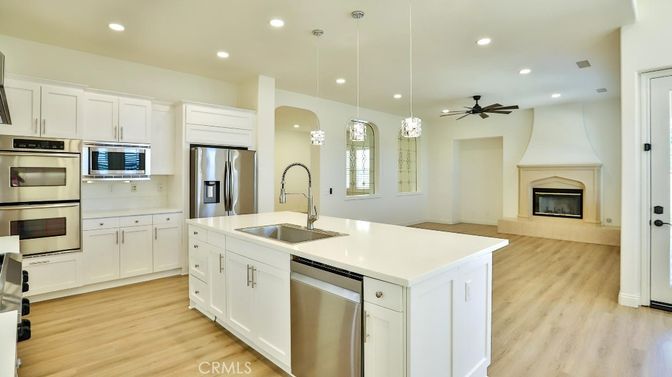 Fireplace, Interior, Kitchen, Pendant Lights, Recessed Lighting, Stainless Steel Appliances, Wood Texture Flooring