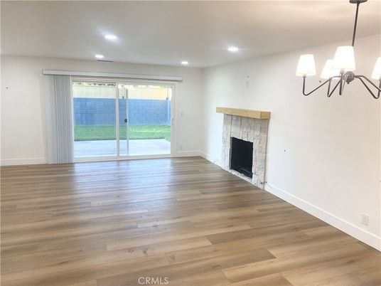 Empty room, Fireplace, Interior, Recessed Lighting, Wood Texture Flooring