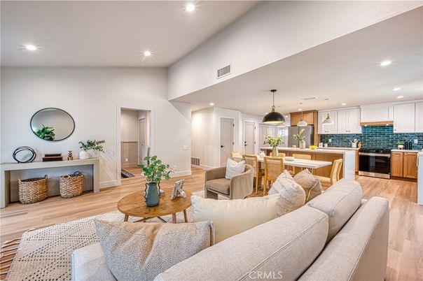 Dining room, Interior, Kitchen, Living room, Pendant Lights, Recessed Lighting, Stainless Steel Appliances, Wood Texture Flooring