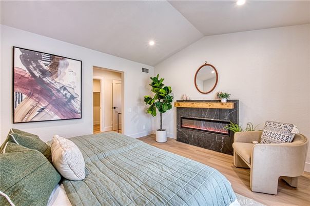 Bedroom, Fireplace, Interior, Recessed Lighting, Wood Texture Flooring