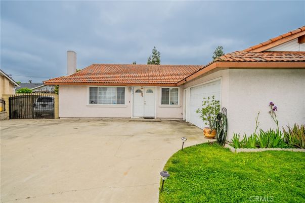 Attached, Backyard, Exterior, Facade, Spanish Mediterranean
