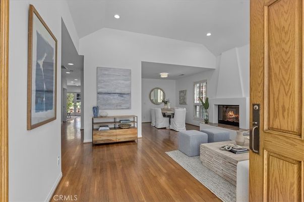 Dining room, Fireplace, Interior, Living room, Recessed Lighting, Wood Texture Flooring