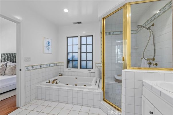 Bathroom, Bedroom, Glass Shower, Interior, Recessed Lighting, Tile Countertops, Wood Texture Flooring