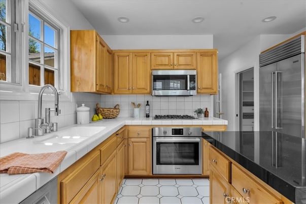 Interior, Kitchen, Recessed Lighting, Stainless Steel Appliances, Tile Countertops